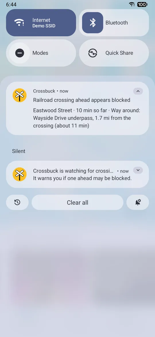 A Crossbuck notification on Android: Railroad crossing ahead appears blocked, Eastwood Street, way around the Wayside Drive underpass, 1.7 mi from the crossing, about 11 minutes.